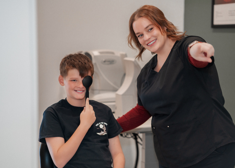 Pediatric patient completing an eye exam